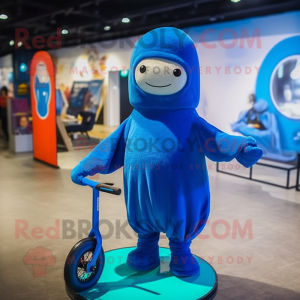 Blue Unicyclist mascot costume character dressed with a Hoodie and Shawls