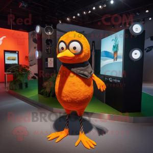 Orange Blackbird mascot costume character dressed with a Bootcut Jeans and Digital watches