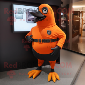 Orange Blackbird mascot costume character dressed with a Bootcut Jeans and Digital watches