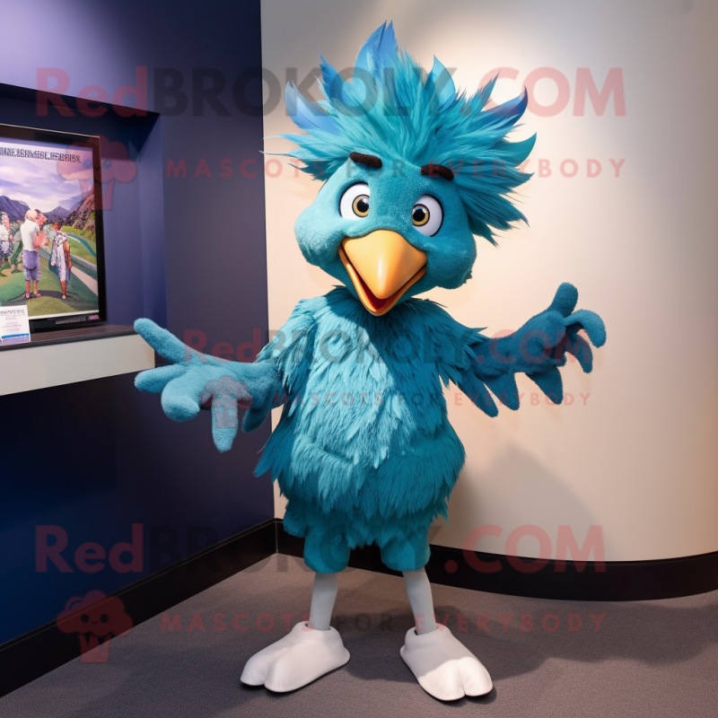 Teal Harpy mascot costume character dressed with a Skinny Jeans and Bow ties Teal Harpy mascot costume character dressed with a Skinny Jeans and Bow ties