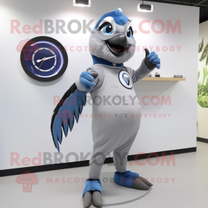 Gray Blue Jay mascot costume character dressed with a Jumpsuit and Digital watches