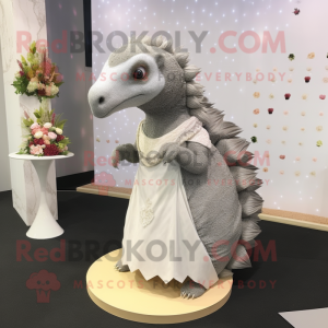 Gray Pangolin mascot costume character dressed with a Wedding Dress and Earrings