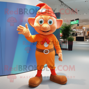 Orange Elf mascot costume character dressed with a Oxford Shirt and Anklets