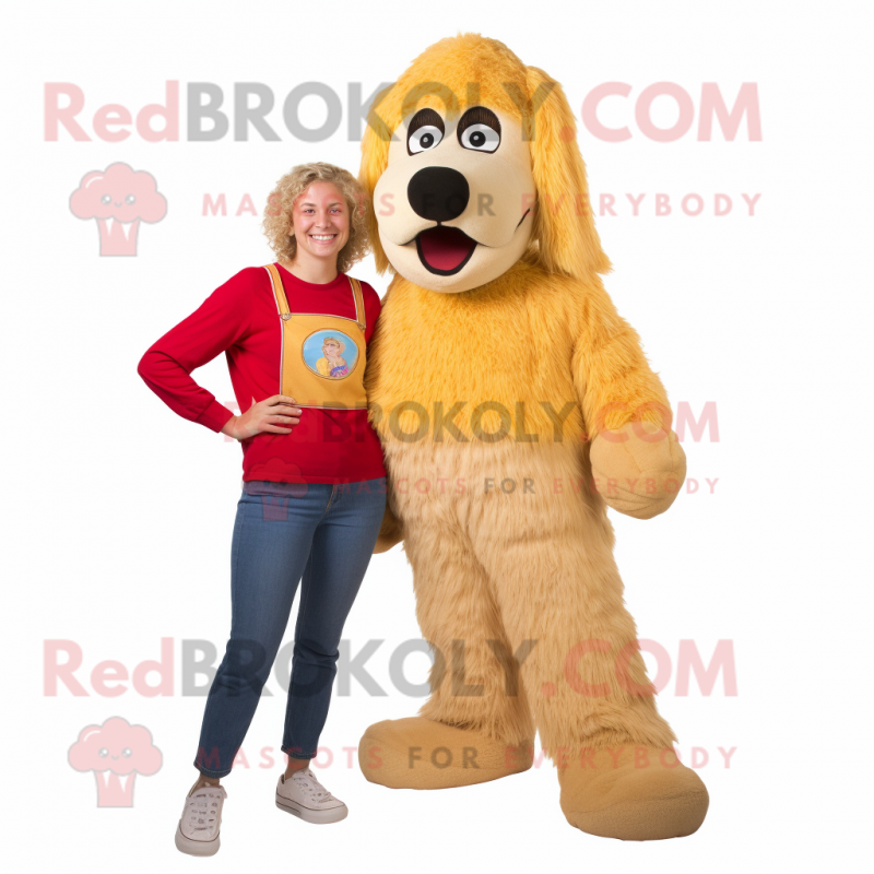 Gold Shepard'S Pie mascot costume character dressed with a Mom Jeans and Shoe laces Gold Shepard'S Pie mascot costume character dressed with a Mom Jeans and Shoe laces