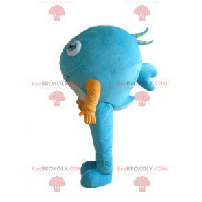 Blue fish mascot with a very smiling yellow t-shirt -