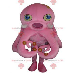 Mascotte de pieuvre rose géante avec les yeux bleus -