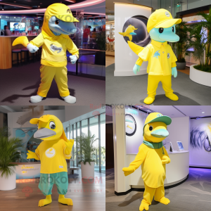 Lemon Yellow Dolphin mascot costume character dressed with a Graphic Tee and Berets