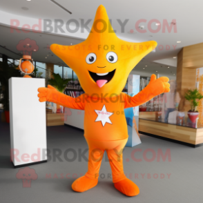 Orange Starfish mascot costume character dressed with a Long Sleeve Tee and Lapel pins