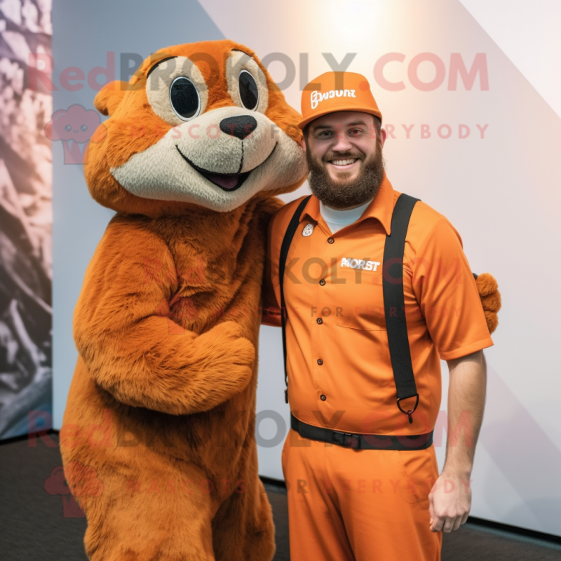 Rust Marmot mascot costume character dressed with a Jumpsuit and Watches Rust Marmot mascot costume character dressed with a Jumpsuit and Watches