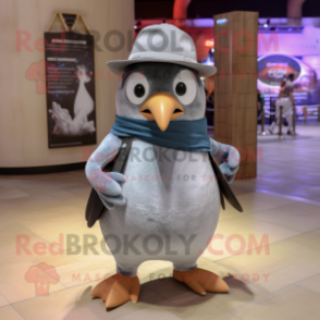 Gray Penguin mascot costume character dressed with a Jeans and Hat pins