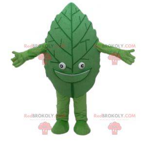 Mascote de folha verde gigante e sorridente - Redbrokoly.com