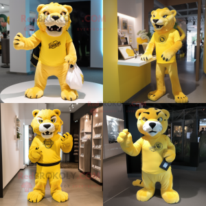 Lemon Yellow Smilodon mascot costume character dressed with a Graphic Tee and Clutch bags