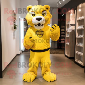 Lemon Yellow Smilodon mascot costume character dressed with a Graphic Tee and Clutch bags