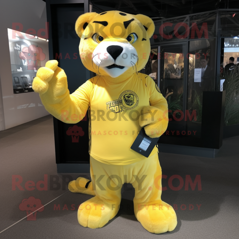 Lemon Yellow Smilodon mascot costume character dressed with a Graphic Tee and Clutch bags