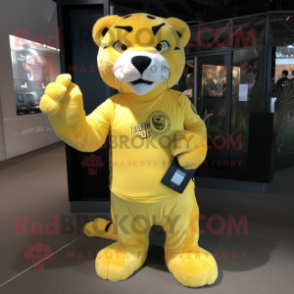 Lemon Yellow Smilodon mascot costume character dressed with a Graphic Tee and Clutch bags