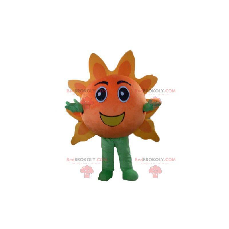 Mascotte de soleil géant orange et jaune très souriant -