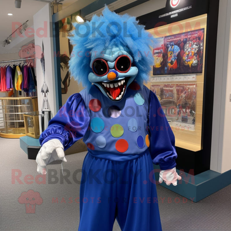 Blue Evil Clown mascot costume character dressed with a Bermuda Shorts and Shawl pins