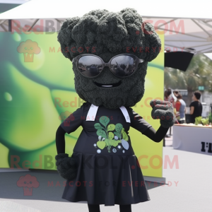 Black Broccoli mascot costume character dressed with a A-Line Dress and Sunglasses