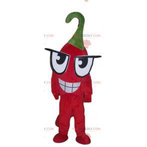 Mascote gigante e engraçado de pimenta vermelha com olhos