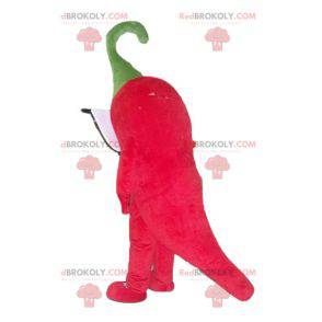 Riesiges und lustiges rotes Pfeffermaskottchen mit großen Augen
