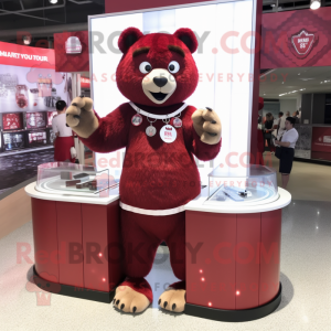 Maroon Bear mascot costume character dressed with a Skirt and Bracelet watches