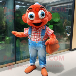 Red Clown Fish mascot costume character dressed with a Denim Shorts and Belts