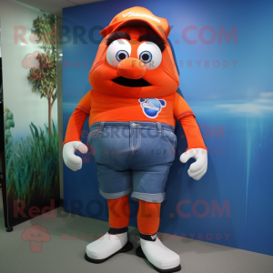 Red Clown Fish mascot costume character dressed with a Denim Shorts and Belts