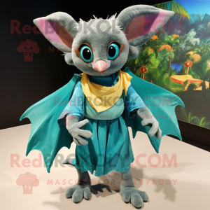 Teal Fruit Bat mascot costume character dressed with a Wrap Skirt and Rings