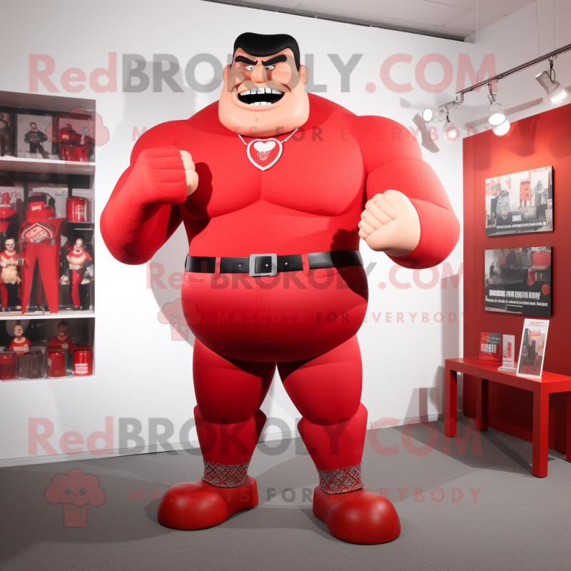 Red Strongman mascot costume character dressed with a Suit Pants and Pocket squares