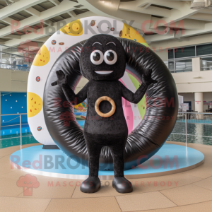 Black Donut mascot costume character dressed with a Bikini and Rings