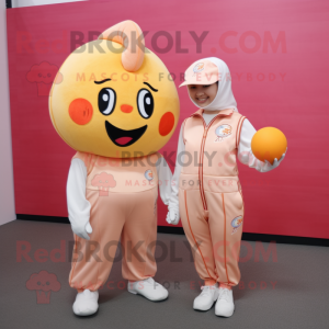 Peach Petanque Ball mascot costume character dressed with a Jumpsuit and Coin purses