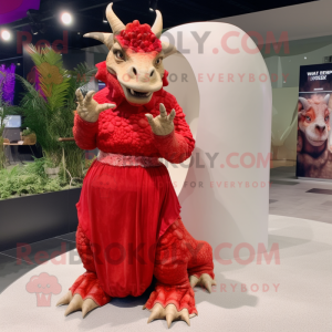 Red Triceratops mascot costume character dressed with a Maxi Dress and Rings