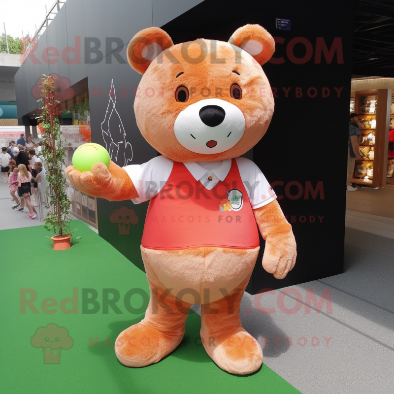 Peach Bear mascot costume character dressed with a Polo Tee and Keychains Peach Bear mascot costume character dressed with a Polo Tee and Keychains