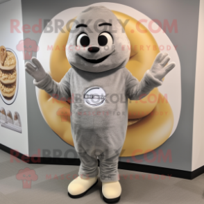 Gray Bagels mascot costume character dressed with a Sweatshirt and Foot pads
