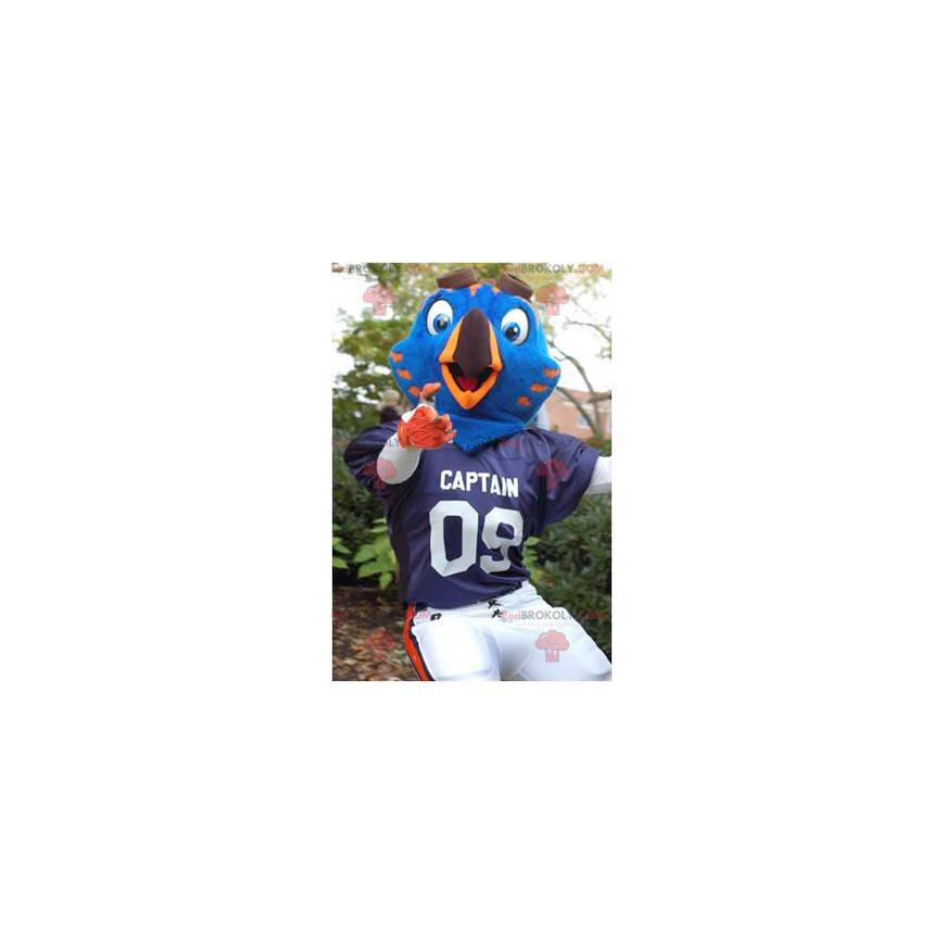 Mascotte uccello blu e arancione in abbigliamento sportivo -