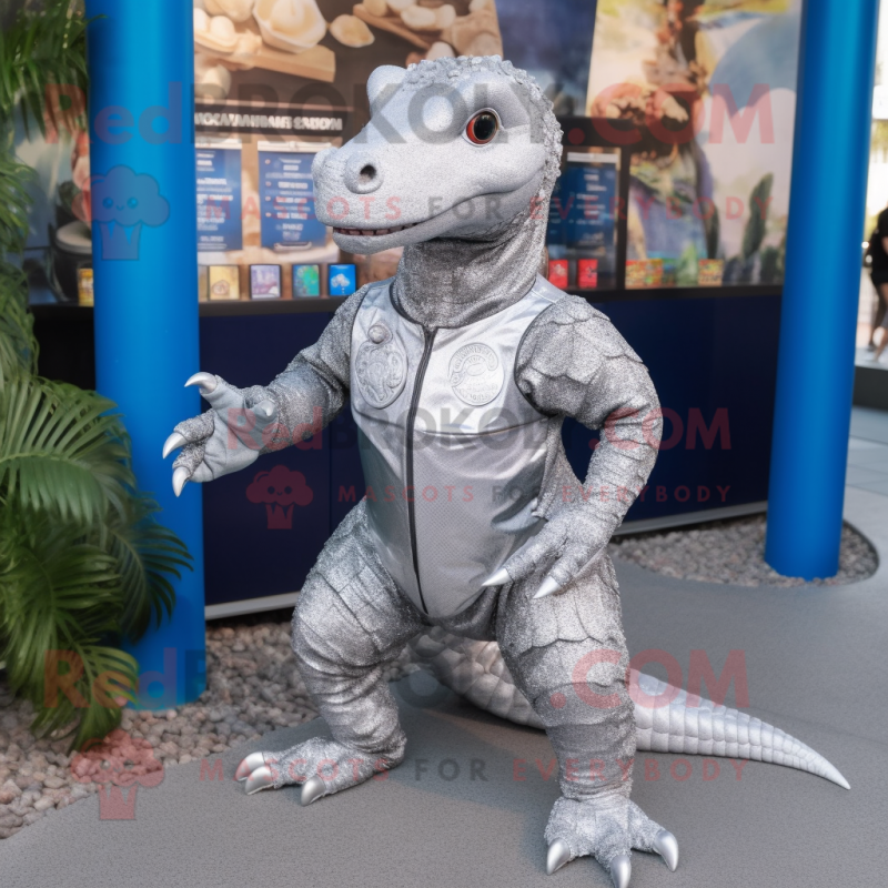 Silver Komodo Dragon mascot costume character dressed with a Chinos and Coin purses Silver Komodo Dragon mascot costume character dressed with a Chinos and Coin purses