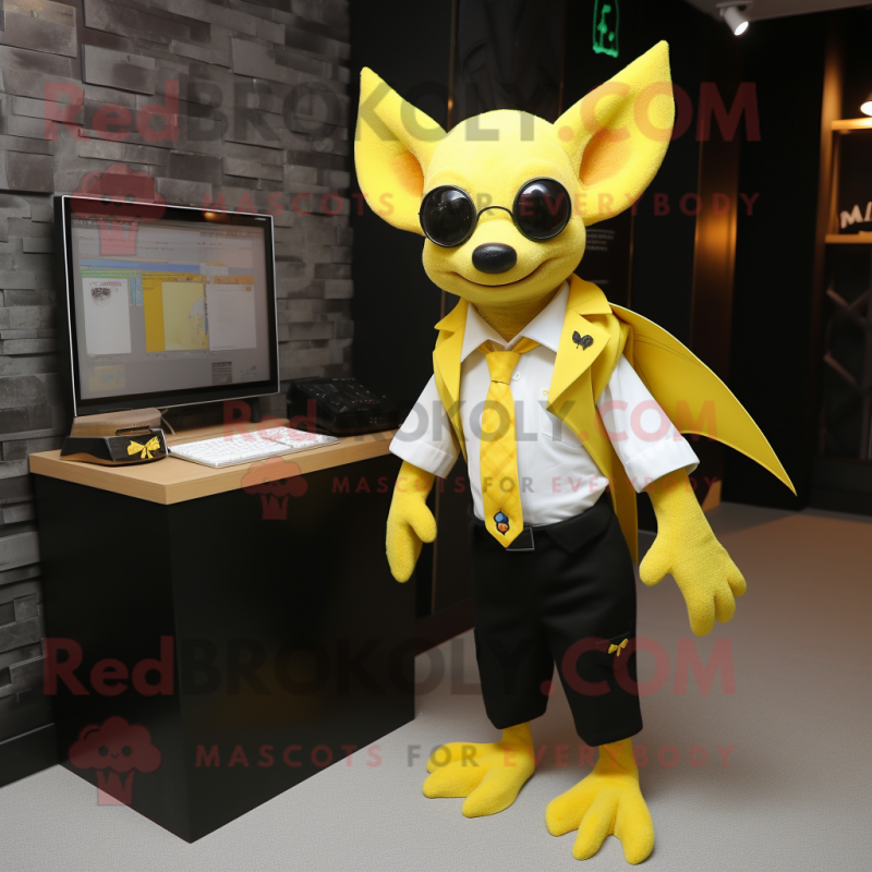 Yellow Bat mascot costume character dressed with a Blazer and Earrings