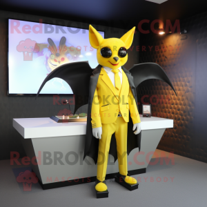 Yellow Bat mascot costume character dressed with a Blazer and Earrings