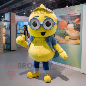 Lemon Yellow Momentum mascot costume character dressed with a Denim Shorts and Keychains