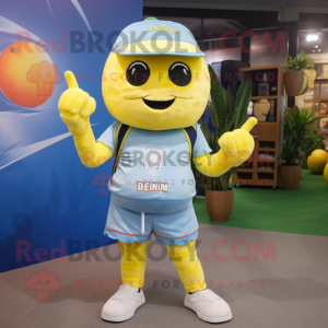 Lemon Yellow Momentum mascot costume character dressed with a Denim Shorts and Keychains