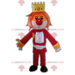 Mascote rei com uma coroa e um nariz de palhaço - Redbrokoly.com