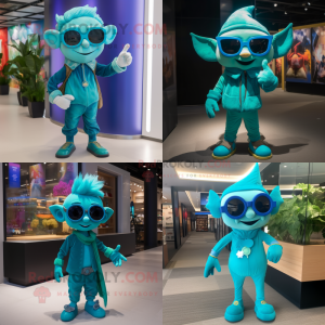 Turquoise Elf mascot costume character dressed with a Jumpsuit and Sunglasses