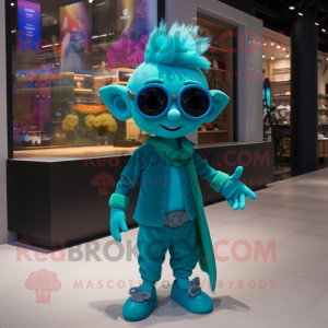 Turquoise Elf mascot costume character dressed with a Jumpsuit and Sunglasses