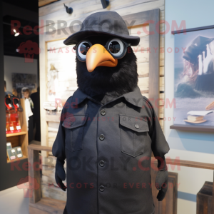 Black Blackbird mascot costume character dressed with a Oxford Shirt and Headbands