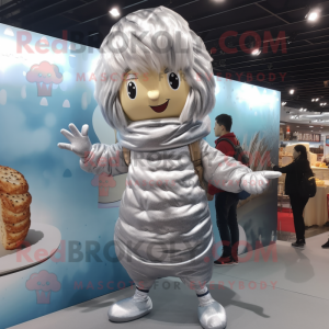 Silver Croissant mascot costume character dressed with a Cardigan and Hair clips