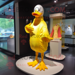 Lemon Yellow Muscovy Duck mascot costume character dressed with a One-Piece Swimsuit and Shawl pins