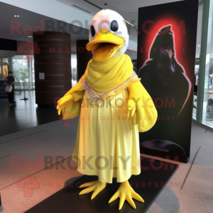 Lemon Yellow Muscovy Duck mascot costume character dressed with a One-Piece Swimsuit and Shawl pins