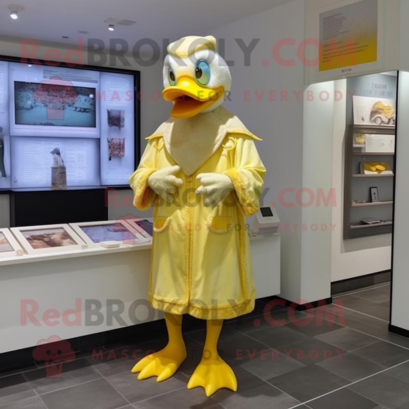 Lemon Yellow Muscovy Duck mascot costume character dressed with a One-Piece Swimsuit and Shawl pins