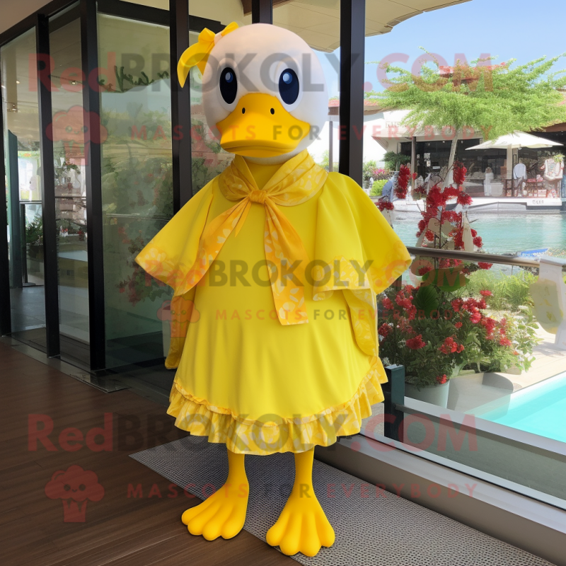 Lemon Yellow Muscovy Duck mascot costume character dressed with a One-Piece Swimsuit and Shawl pins