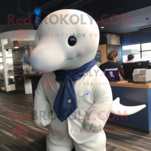 Navy Beluga Whale mascot costume character dressed with a Cardigan and Tie pins